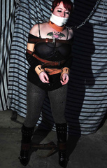 curvy redhead - strapped and chained