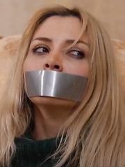 Cute Turkish Blonde Tape Gagged.
