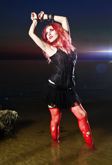Julia punk in handcuffs in the water
