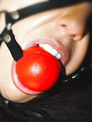 Ballgagged and hogtied on the floor