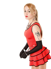 Linda in handcuffs and a red dress