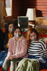 3 beautiful women's mouths are closed with a silver ban