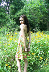Girl in handcuffs in nature