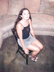 Tied to a chair and gagged with pantyhose