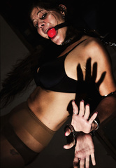 Cuffed in the dungeon.