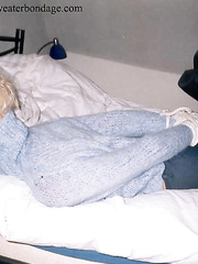 Sweaterbondage - Dawn in light blue turtleneck sweater