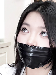 Cute Asian girl Gagged
