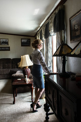 Secretary tied at home