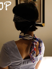 CJP: Woman blindfolded and wearing a neckscarf