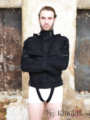 Hunk Locked in a Black Straitjacket While His Latex Mis