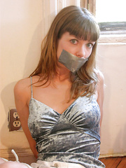 Elkie Cooper - exposed breasts and hogtied