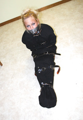 Blonde in sleep sack and blindfold