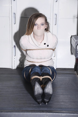 Amanda Bound in sweater and boots