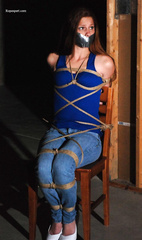 Stacy Snow chair tied in tight jeans