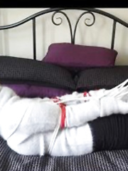 Tied up and gagged wearing sweaters