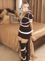 Blonde tied to bedpost